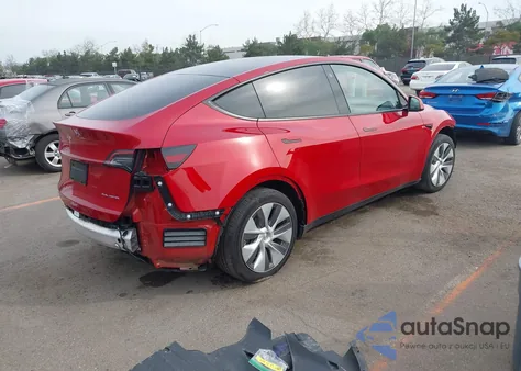 2023 Tesla Model Y Awd/Long Range Dual Motor All-Wheel Drive z USA, uszkodzony, nr VIN 7SAYGDEE9PA115198